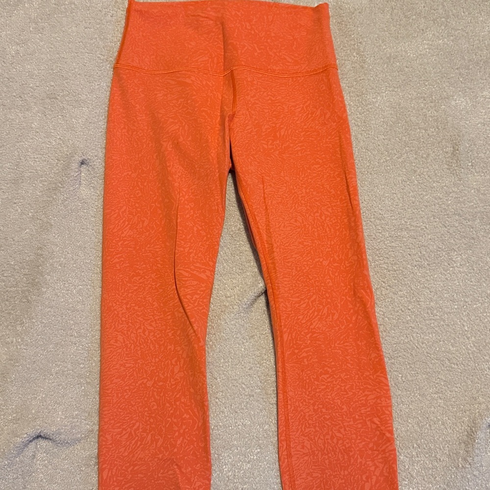 lululemon Crunch Warm Coral Wunder Train High Rise 23” size 8